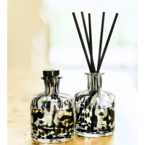 Stylized photo of Dalmation diffuser vessels by The First Burn Candle Co